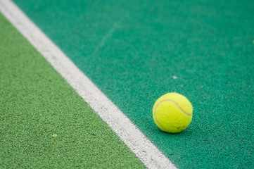 Tennis ball on court