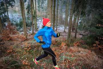 running in the wintry forest