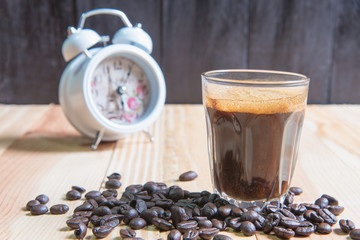 espresso in a glass on wooden table