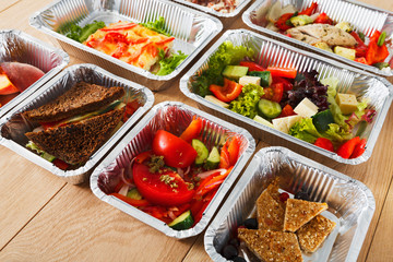 Healthy food in boxes, diet concept.