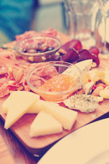 Cheese and sausage platter, toned