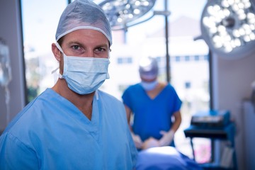 Fototapeta na wymiar Portrait of male nurse wearing surgical mask 