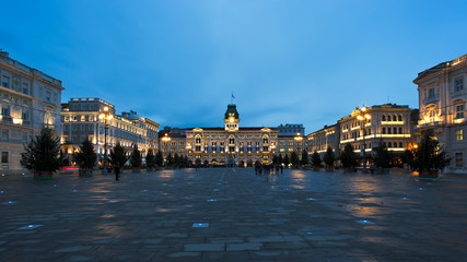 Piazza Unità d'Italia in Trieste, Italy,headed by the city's municipal building by night.