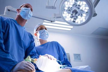 Surgeons interacting with each other in operation theater