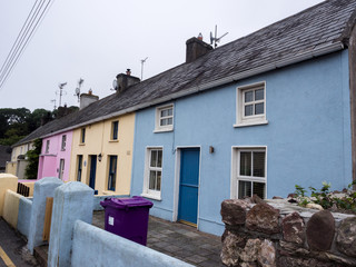 Fototapeta na wymiar Colourful cottages in Dunmore East village, Waterford, Republic of Ireland