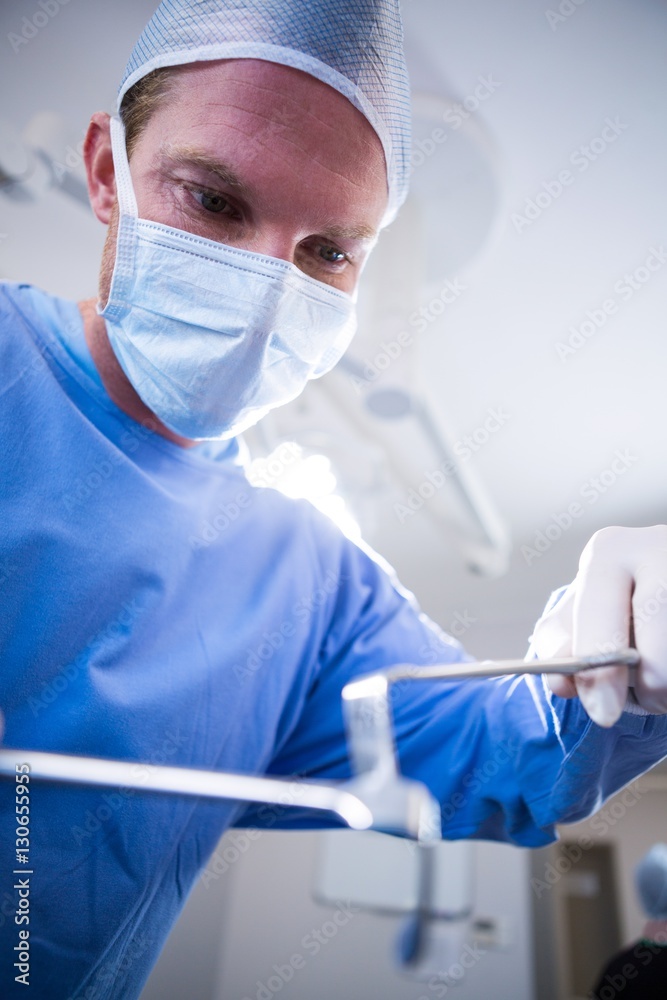 Poster surgeons performing operation in operation theater