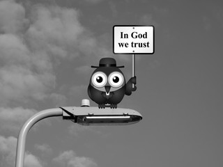 Comical bird vicar with In God We Trust sign 