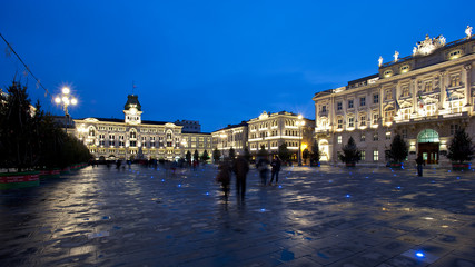 Piazza Unità d'Italia in Trieste, Italy,headed by the city's municipal building by night.