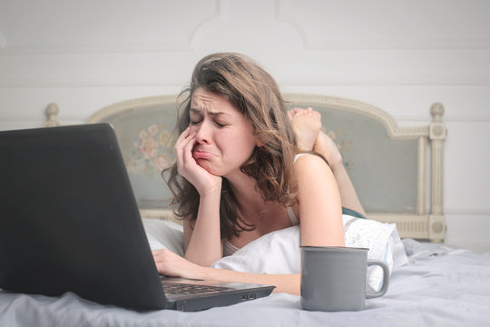 Woman crying watching a movie