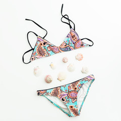 Female summer swimsuit. Flat lay, Top view