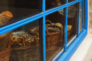 Traditional European boulangerie concept. Basket with baguettes