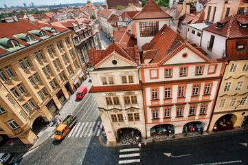 Cityscape with red tiled roofs and Baroque houses of historical town Prague. UNESCO World Heritage Register