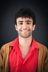 Obraz premium Handsome man doing different expressions in different sets of clothes: love