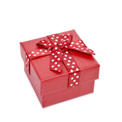 red gift box tied with red ribbon