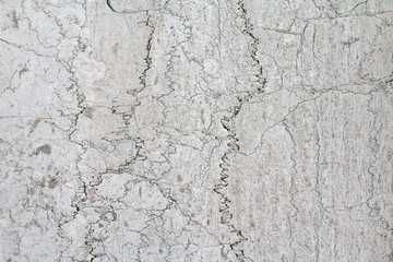 Old gray marble background with cracks. Old roman stones.