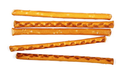 salty cracker pretzel sticks isolated on white background