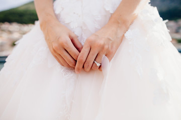 engagement ring on bride's hand