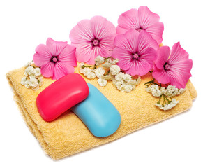 Soap, flower and towel