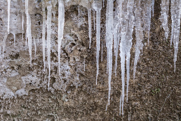 Eis am Fels gefroren Hintergrund Eiszapfen