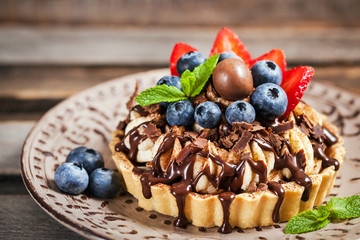 Banoffee chocolate pie decorated with chocolate, fresh blueberry