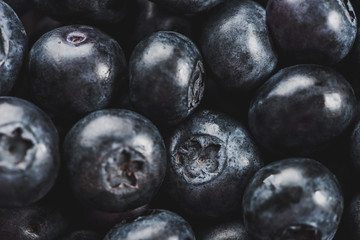 Ripe fresh raw blueberries pile close up