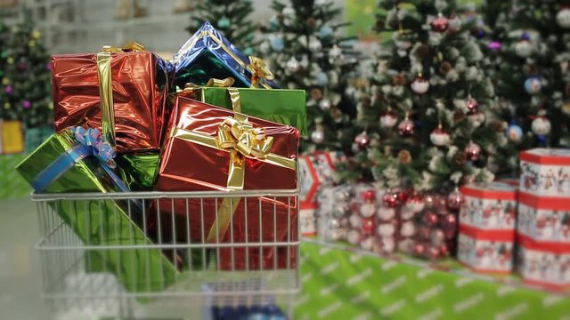 Shopping carts full of Christmas gifts. Christmas and shopping concept