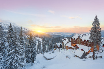 Winter resort with slopes for skiing and snowboarding