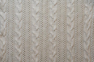 Light knitted fabric texture background.