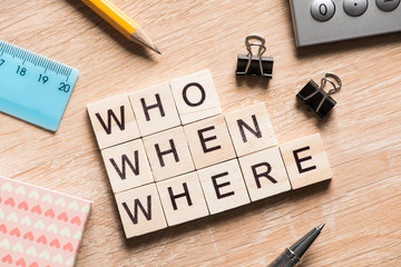 Conceptual business keywords on table with elements of game making crossword