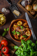 Homemade tortellini with tomato sauce