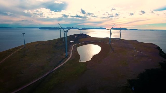 Windmills for electric power production. Arctic View Havoygavelen windmill park, Havoysund, Northern Norway Aerial footage.