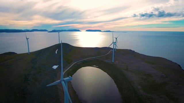 Windmills for electric power production. Arctic View Havoygavelen windmill park, Havoysund, Northern Norway Aerial footage.