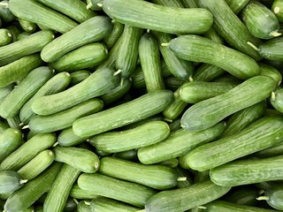 Fresh heap cucumber full screen background