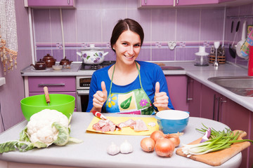 Happy woman in the kitchen
