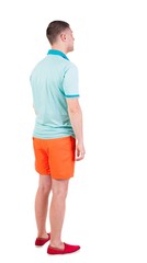 Back view of young manin shorts looking.