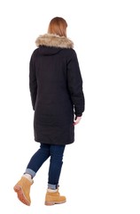 Back view of going  woman in parka. walking young girl. Rear view people collection.  backside view of person.  Isolated over white background.