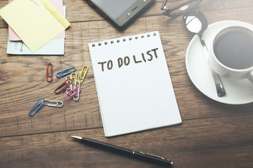 coffee, pen and notepad with text 