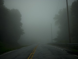 Diminishing perspective of misty road