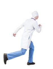Back view of running doctor in a robe hurrying to help the patie