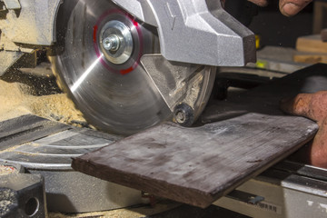 Cut Saw cutting old board