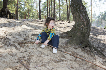 In the summer in the forest little girl thrilled tyane of land l