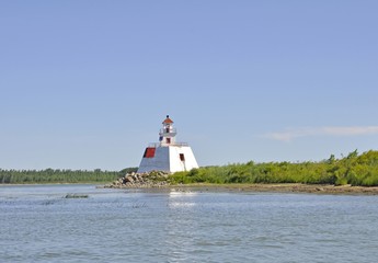 Fototapeta na wymiar lighthouse in the Saint Lawrence Iles des Sorel region near Sorel-Tracy, Quebec Canada 