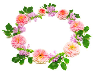 Wreath with leaves and flowers of pink roses isolated on white b