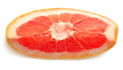 Slice of grapefruit close-up isolated on white background