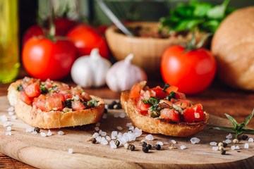Fototapeta na wymiar Classic Bruschettas with Tomatoes