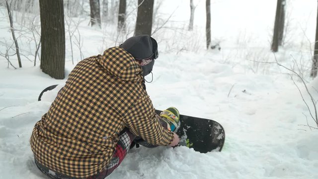 Fastens mounting on a snowboard. Close-up.