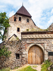 Fototapeta premium Wooden entrance gate of Tocnik medieval castle in Central Bohemia, Czech Republic, Europe