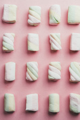 Marshmallow pink and white in rows in a pink travel