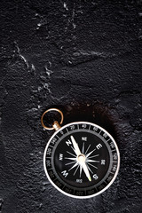 compass on dark background concept - direction motion top view © 279photo