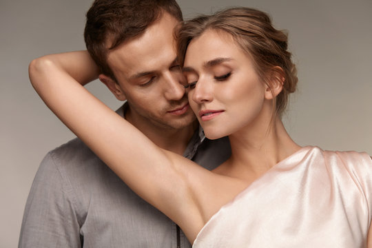 Man Close To Sexy Woman. Female Showing Smooth Skin Of Armpits.
